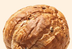 Freshly baked par baked cinnamon raisin bread Freshly baked par baked cinnamon raisin bread with a golden crust and visible raisins