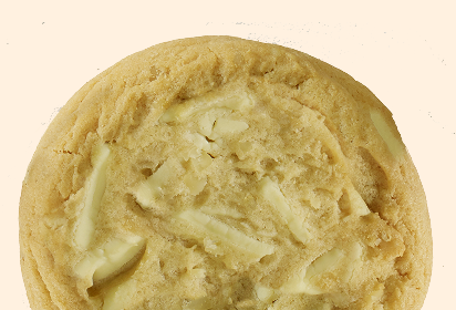 freshly baked macadamia white chocolate Close-up of a freshly baked macadamia white chocolate