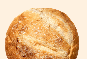 neo tuscan boule sourdough bread Round loaf of neo tuscan boule sourdough bread with a golden-brown crust