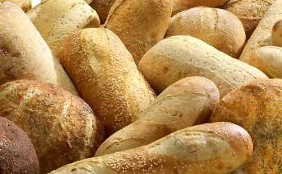 Selection of par-baked breads Selection of par-baked breads, including sesame-topped varieties